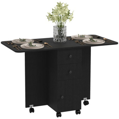 Wyld Haus Midile Distressed Black Drop Leaf Dining Table With Storage Seats 4 To 6 from B&Q