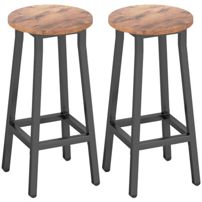 Wyld Haus Rema Hari Set Of 2 Rustic Brown Industrial Round Bar Stools 65Cm With Footrest from B&Q