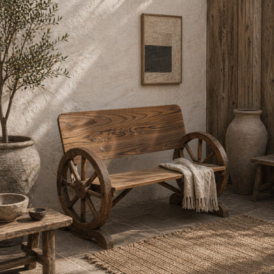 Wyld Haus Livika 2-Seater Fir Wood Garden Bench With Wagon Wheel Side PanelsCarbonised Brown from B&Q