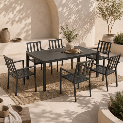 Wyld Haus Tatare 7-Piece Metal Garden Dining Set6 Chairs And Rectangular Table With 50mm Parasol HoleBlack from B&Q