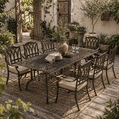 Wyld Haus Vesuno 9-Piece Bronze Cast Aluminium Garden Dining SetRectangular Table With Parasol Hole from B&Q