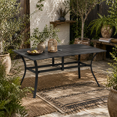 Wyld Haus Ludo 150Cm Steel Black Rectangular Garden Dining Table With Slatted Top And 42mm Parasol Hole from B&Q
