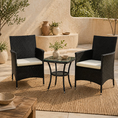 Wyld Haus Rafifi Black Rattan 3-Piece Outdoor Bistro Set With Cushions And 2-Tier Coffee Table from B&Q