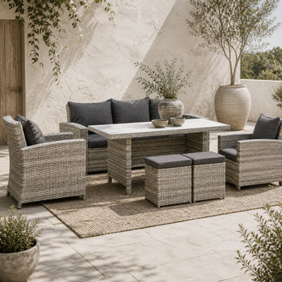 Wyld Haus Vire Light Grey 7-Seater Rattan Outdoor Dining Set With Glass TableArmchairsStools And Cushions from B&Q
