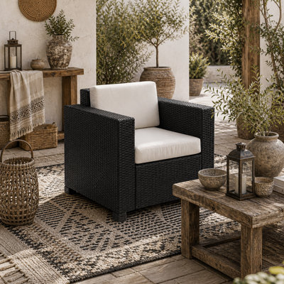 Wyld Haus Raco Black Rattan Single Outdoor Armchair With Thick Cushioned Seat And Armrests from B&Q