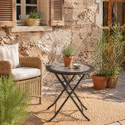 Wyld Haus Brown Rattan-Effect Round Folding Glass Top Bistro Table68Cm Diameter (Foldable) from B&Q