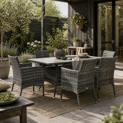 Wyld Haus Zila 6-Seater Grey Rattan Outdoor Dining SetRectangular Glass Table With Cushioned Armchairs from B&Q
