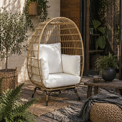Wyld Haus Tasudo Khaki Rattan-Style Egg Chair With White Cushions And PillowsSingle-Seat Outdoor Lounge Chair from B&Q