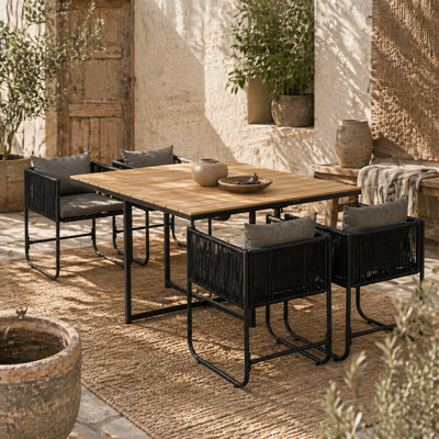 Wyld Haus Lilere 5-Piece Black Rattan Cube Garden Dining Set With Cushions And Wood-Effect Table from B&Q
