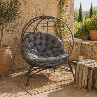 Wyld Haus Ranido Grey Folding Rattan-Style Freestanding Egg Chair With Bottle Holder And Cushion from B&Q