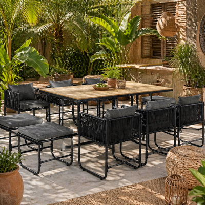 Wyld Haus Latata 10-Seater Black Rattan-Style Cube Garden Dining Set With Stools And Rectangular Table from B&Q