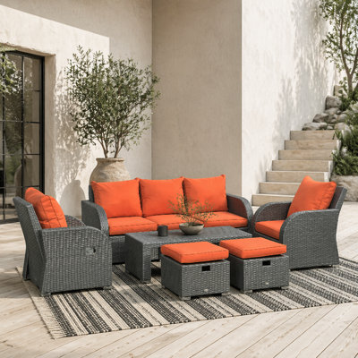 Wyld Haus Lerami 7-Seater Rattan Outdoor SetReclining ArmchairsSofaOrange Cushions from B&Q