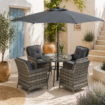 Wyld Haus Rolana Nivi 4-Seater Mixed Grey Rattan Outdoor Dining Set With Parasol And Cushions from B&Q