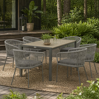 Wyld Haus Riluvi Grey 7-Piece Outdoor Dining Set6 Cushioned Chairs And Rectangular Acacia Wood-Top Table from B&Q