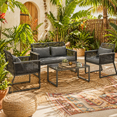 Wyld Haus Mopafa 4 Piece Rattan Garden Furniture Set With CushionsCharcoal Grey  2 Chairs Loveseat Coffee Table from B&Q