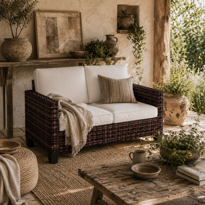 Wyld Haus Palo Brown Pe Rattan 2-Seater Outdoor Sofa With Cream Cushions from B&Q