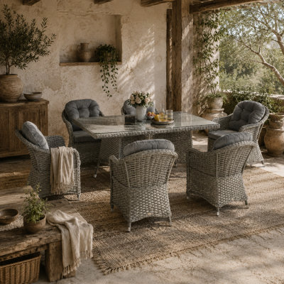 Wyld Haus Bami 7-Piece Light Grey Rattan Outdoor Dining Set6 Cushioned Chairs With Rectangular Tempered Glass Table from B&Q