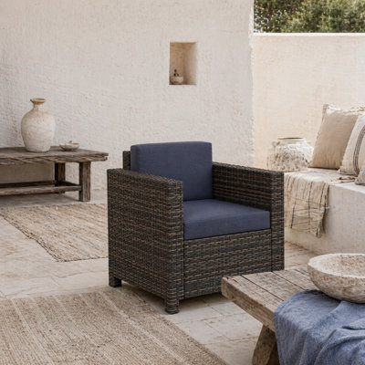 Wyld Haus Zivi Faux Rattan Mixed Brown And Navy Garden Armchair With 10Cm Cushions from B&Q