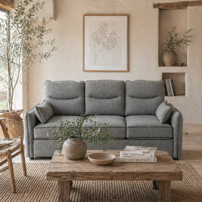 Wyld Haus Pamazi Grey Faux Leather 3-Seater SofaModern Compact DesignSide PocketsIncludes 2 Pillows from B&Q