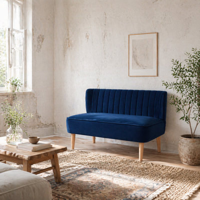Wyld Haus Haleco Dark Blue Velvet-Feel 2-Seater Loveseat With Panel-Tufted Back And Natural Wooden Legs from B&Q