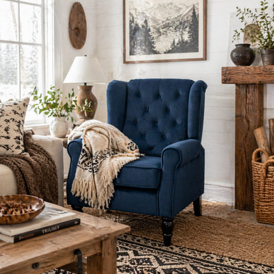Wyld Haus Rake Dark Blue Retro Wingback Accent Chair With Button Tufting And Velvet-Effect Upholstery from B&Q