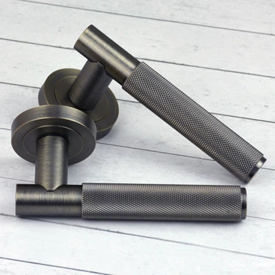  - Antique Brass Knurled Lever On Rose Door Handle Pair Internal 50mm Diameter