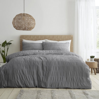 Catherine Lansfield Bedding Seersucker Embellished Duvet Cover Set With Pillowcase Grey from B&Q