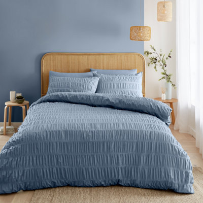 Catherine Lansfield Bedding Seersucker Embellished Duvet Cover Set With Pillowcases Lansfield Blue from B&Q