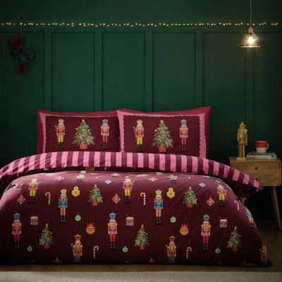 Catherine Lansfield Christmas Nutcracker Stripe Reversible Duvet Cover Set With Pillowcases Plum