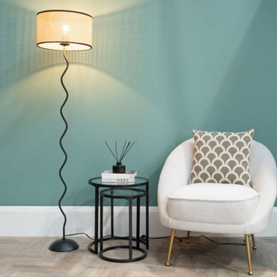 Valuelights Black Metal Wavy Stem Floor Lamp With A Natural Cane Wicker Black Trim Shade from B&Q