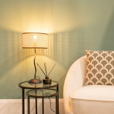 Valuelights Black Metal Wavy Single Stem Table Lamp With A Natural Cane Wicker Black Trim Shade from B&Q