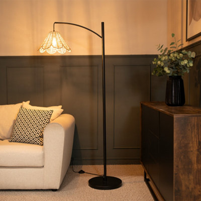 Valuelights Preto Black Metal Curve Stem Floor Lamp With A Rattan Wicker Scalloped Edge Shade from B&Q