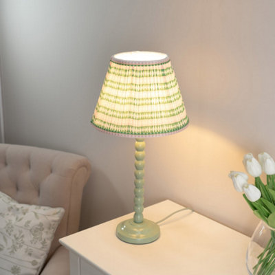 Valuelights Bobbles Sage Green Bobbin Table Lamp With Pink Aztec Pleated Shade from B&Q