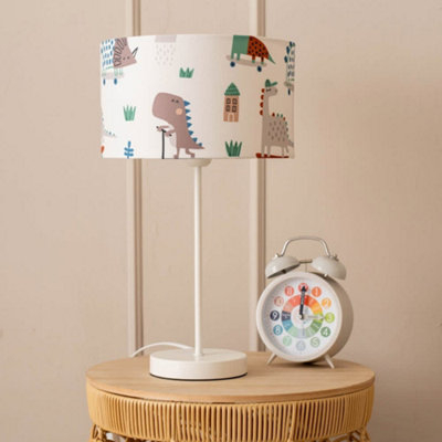Valuelights Charles White Table Lamp With Cartoon Dino Print Shade from B&Q