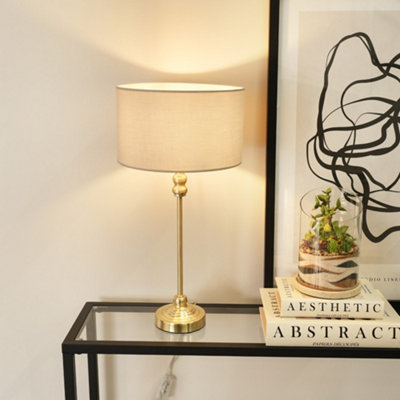 B&Q -  Maggie Gold Metal Candlestick Slim Table Lamp With Natural Fabric Drum Lamp Shade