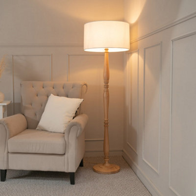 Valuelights Victoria Traditional Light Wood Candlestick Floor Lamp With White Drum Shade from B&Q