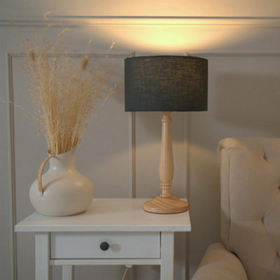 Valuelights Victoria Traditional Light Wood Candlestick Table Lamp With Charcoal Drum Shade from B&Q