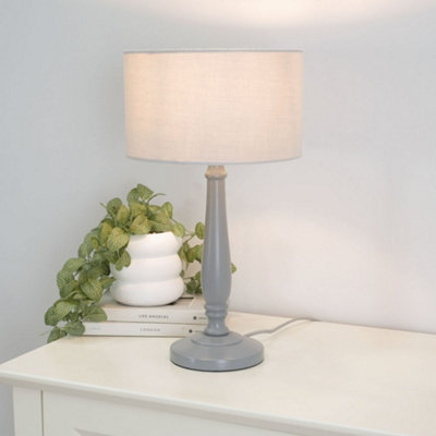 Valuelights Victoria Traditional Grey Wood Candlestick Table Lamp With Grey Drum Shade from B&Q