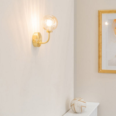 Valuelights Chessy Gold Metal Curved Wall Light With Amber Ribbed Glass Globe ShadeLed Bulb Included from B&Q