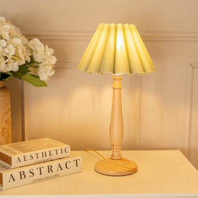 Valuelights Victoria Light Wood Candlestick Stem Table Lamp With Sage Green Scallop Tapered Lamp Shade from B&Q
