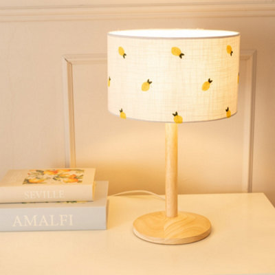 B&Q -  Triston Natural Light Wood Stem Table Lamp With Lemon Embroidered Lamp Shade And Led Bulb