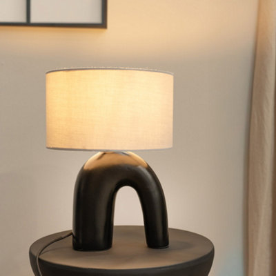 B&Q -  Lia White Fabric Drum Lamp Shade Black Arch Abstract Ceramic Table Lamp And Bulb