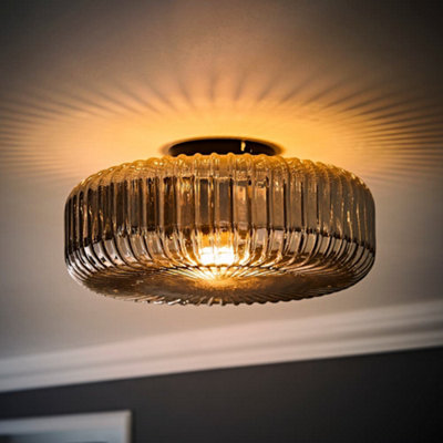 Valuelights Calpe Large Matte Black Flush Ceiling Light With Ribbed Smoked Shade And Bulb from B&Q