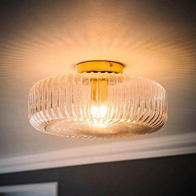 Valuelights Calpe Large Gold Flush Ceiling Light With Ribbed Clear Shade And Bulb from B&Q