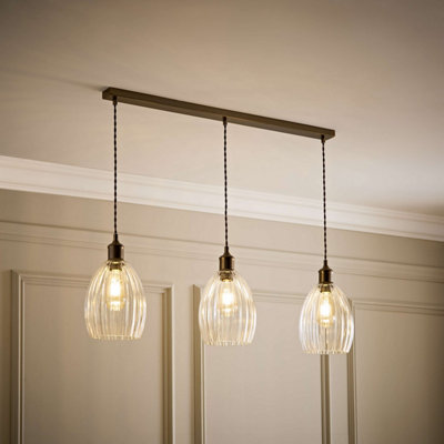 B&Q -  Cheltenham Brushed Brass 3 Drop Bar Ceiling Light With Ribbed Shades