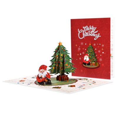 Festive Scene Xmas Tree And Santa Claus 3D Pop Up Christmas Card from B&Q