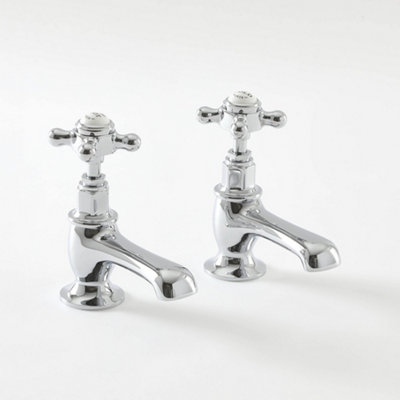 Homestylestore Chrome And White Bathroom Basin Pillar Taps With Crosshead Handles from B&Q