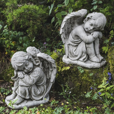 Pair Of Resting Angels Stone Garden Ornaments from B&Q