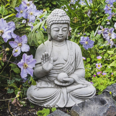 Medium Buddha With Ball In Hand Garden Statue from B&Q