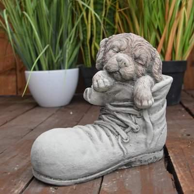 Dog In Shoe Stone Garden Ornament from B&Q